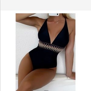 Plunge neck one piece swim suit